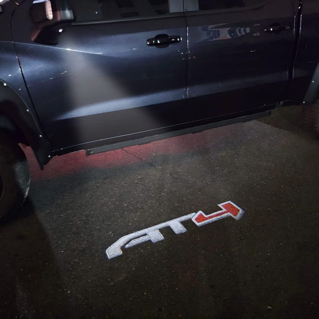 Led At4 Emblems AT4 Design – GMC Sierra/Yukon/Yukon XL LED Puddle Lights – BadgeBeam